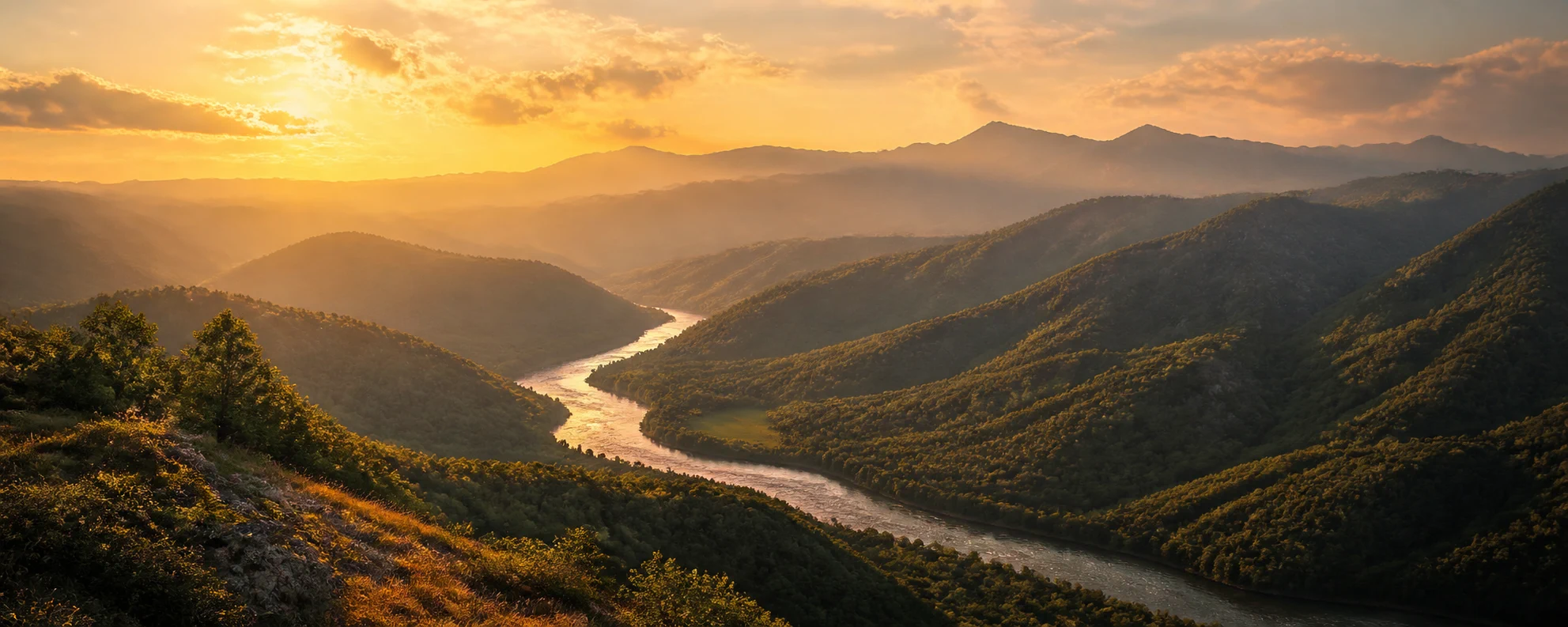 Golden-hour mountain valley and winding river for the featured writing draft